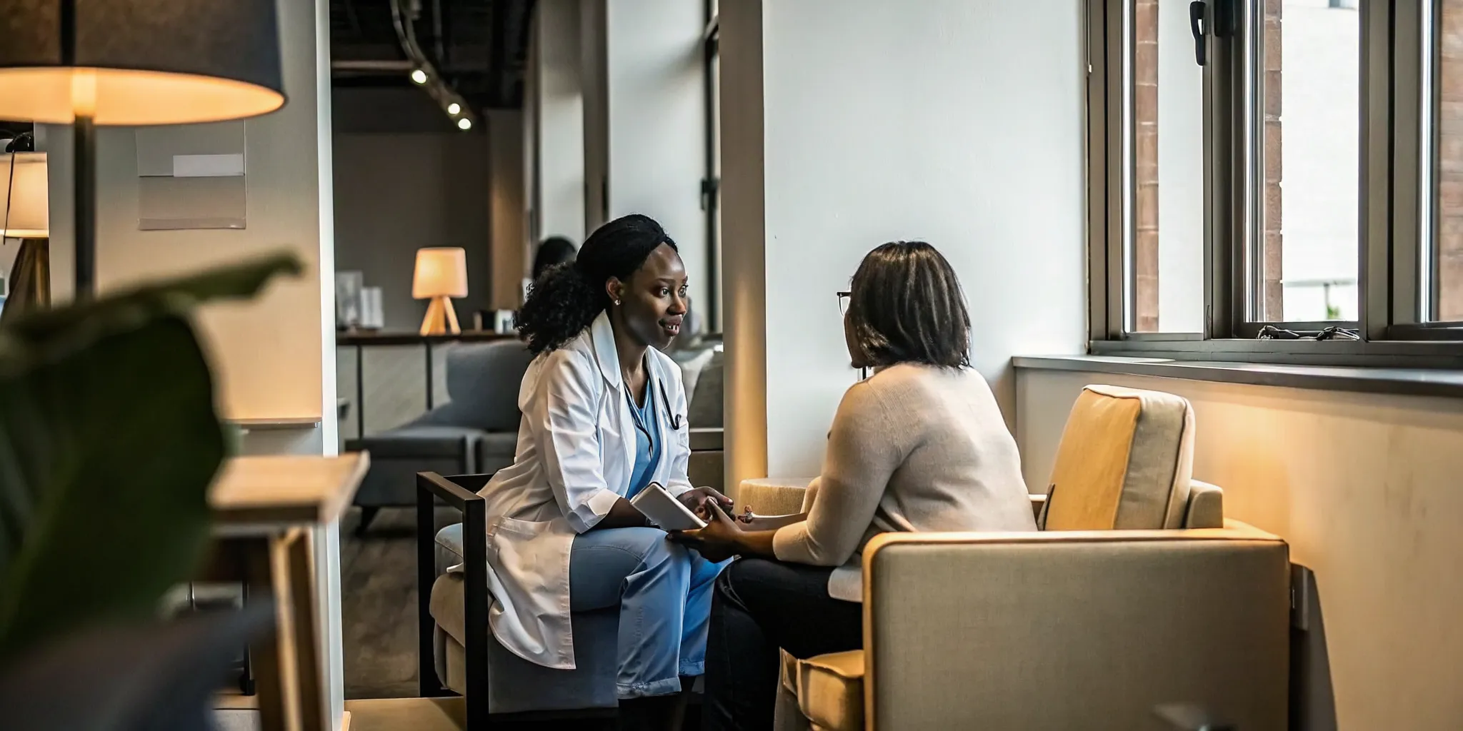 Occupational health clinician consulting an employer in a Tampa clinic